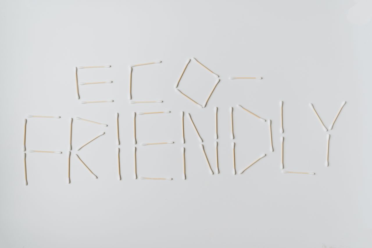 services-01 Cotton swabs spelling out eco-friendly on a clean white surface.